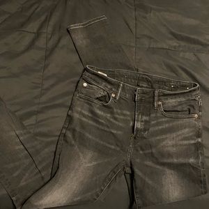 american eagle distressed black super skinny jeans